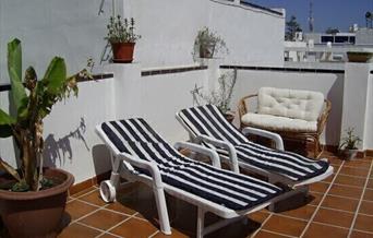 Apartamentos El Barrio