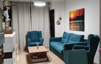 Salón con sofá cama