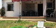 Fachada -terraza-cesped