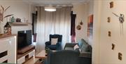 Salón con sofá cama